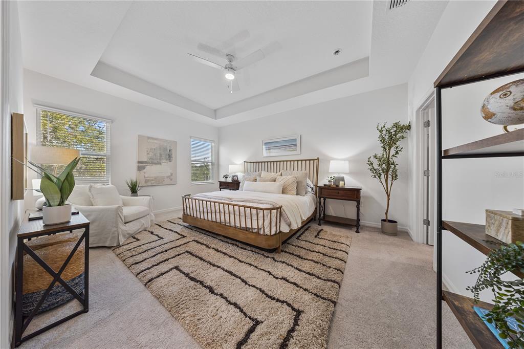 34217 Cinder Way Wesley Chapel, FL 33545 - Photo 20 of 27 a bedroom with a bed and a couch