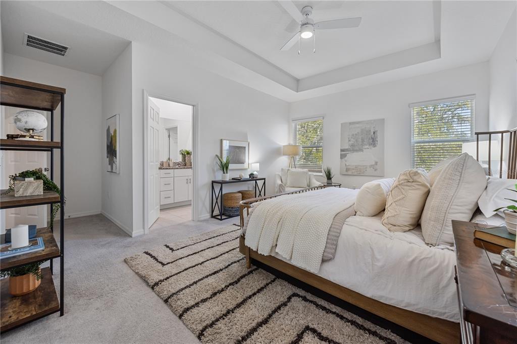 34217 Cinder Way Wesley Chapel, FL 33545 - Photo 25 of 27 a spacious bedroom with a bed and window