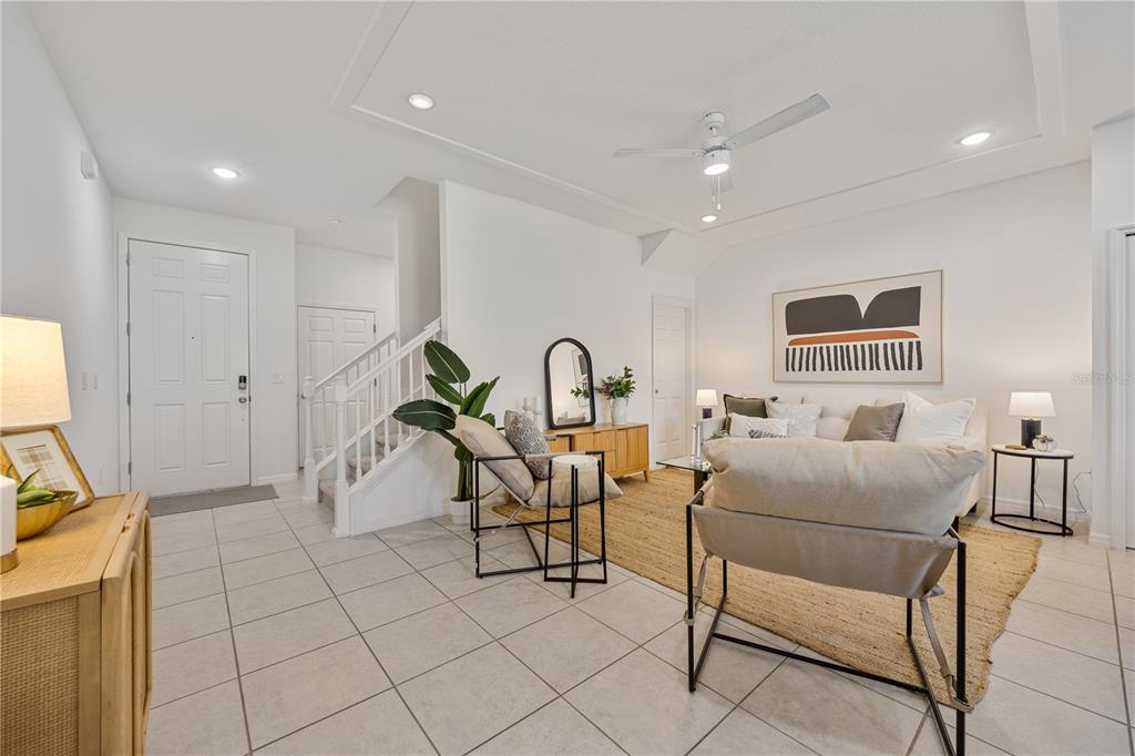 34217 Cinder Way Wesley Chapel, FL 33545 - Photo 10 of 27 a living room with furniture and a window