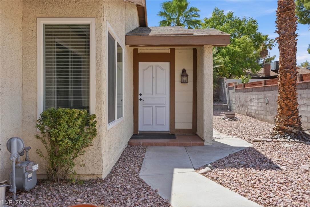 3971 Spring Leaf Drive Las Vegas, NV 89147 - Photo 45 of 48 A welcoming entry invites with a covered porch and low-maintenance landscaping.