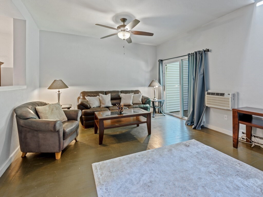 97 Riverview Place, Unit C Southbridge, MA 01550 - Photo 13 of 35 a living room with furniture and a couch