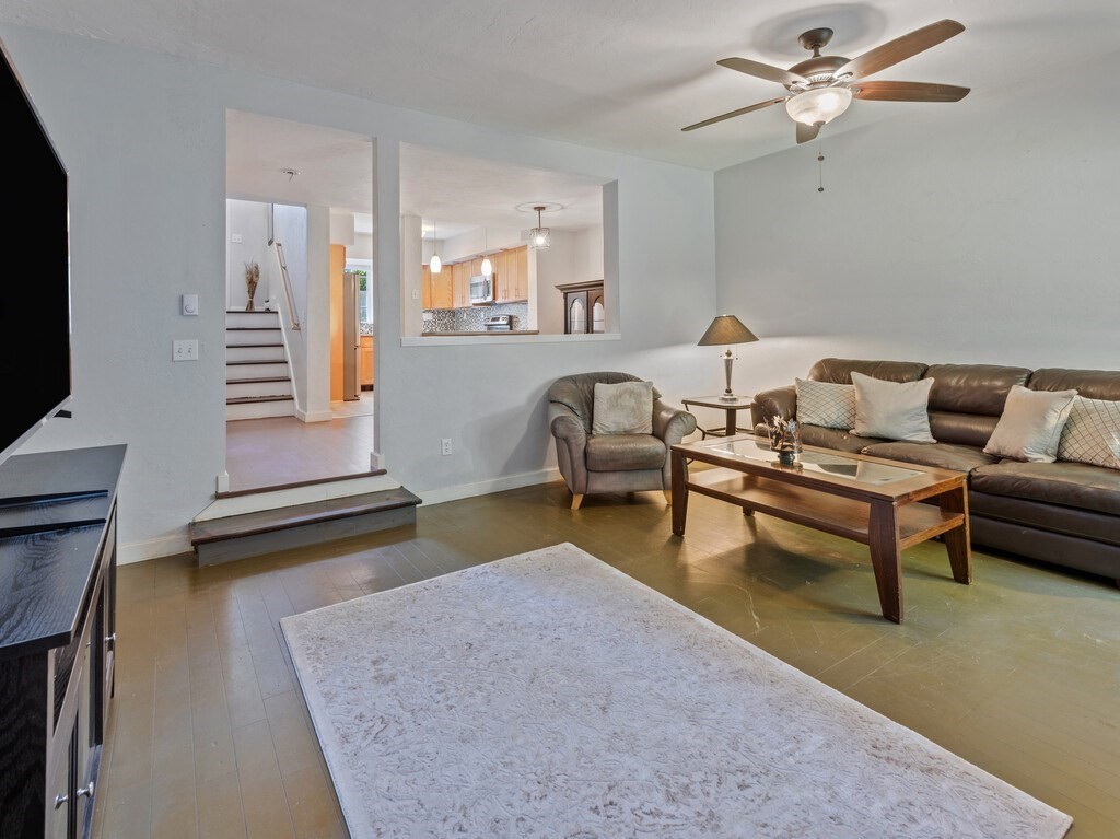97 Riverview Place, Unit C Southbridge, MA 01550 - Photo 14 of 35 a living room with furniture and a flat screen tv