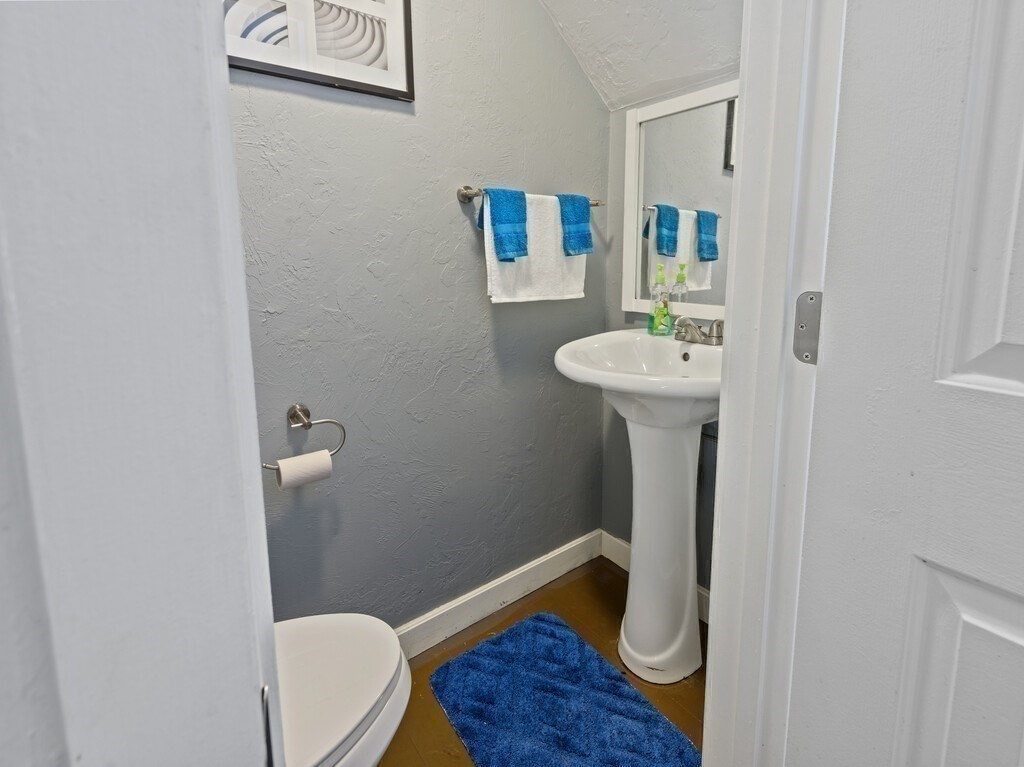 97 Riverview Place, Unit C Southbridge, MA 01550 - Photo 16 of 35 a bathroom with a sink a toilet and shower