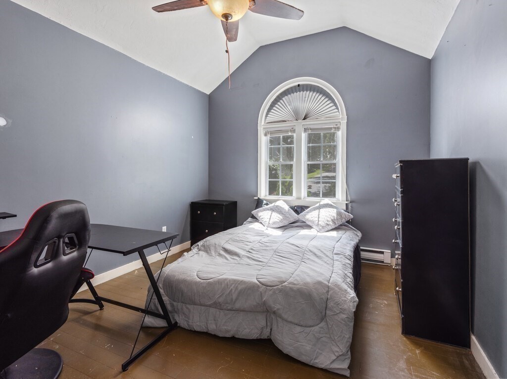 97 Riverview Place, Unit C Southbridge, MA 01550 - Photo 19 of 35 a bedroom with a bed and window