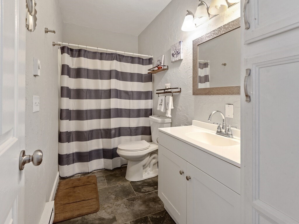 97 Riverview Place, Unit C Southbridge, MA 01550 - Photo 21 of 35 a bathroom with a sink toilet and shower