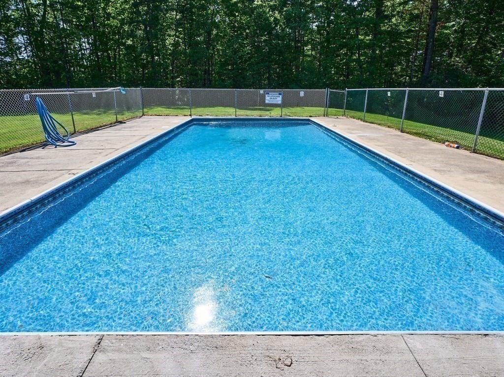 97 Riverview Place, Unit C Southbridge, MA 01550 - Photo 34 of 35 a view of a backyard with swimming pool