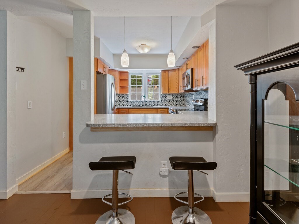 97 Riverview Place, Unit C Southbridge, MA 01550 - Photo 9 of 35 a bathroom with a sink and a mirror