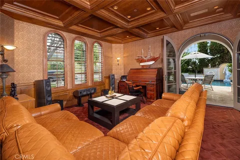 a view of kitchen with a sink and cabinets