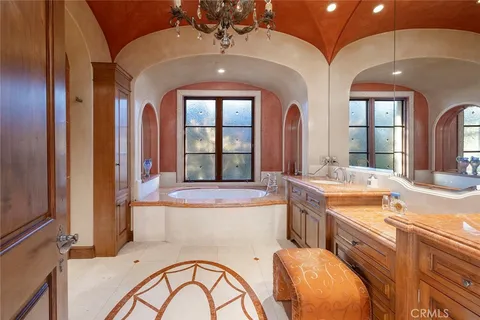 a view of a terrace with two chairs and a table