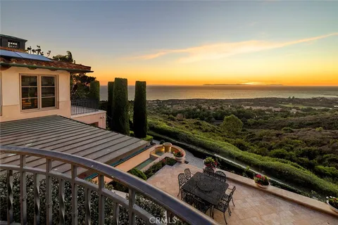 a bedroom with a bed couch and window