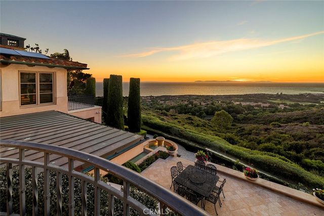 a bedroom with a bed couch and window