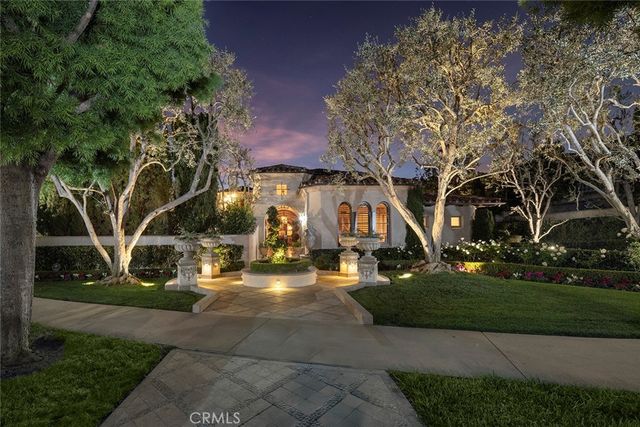 a view of a park with plants and trees