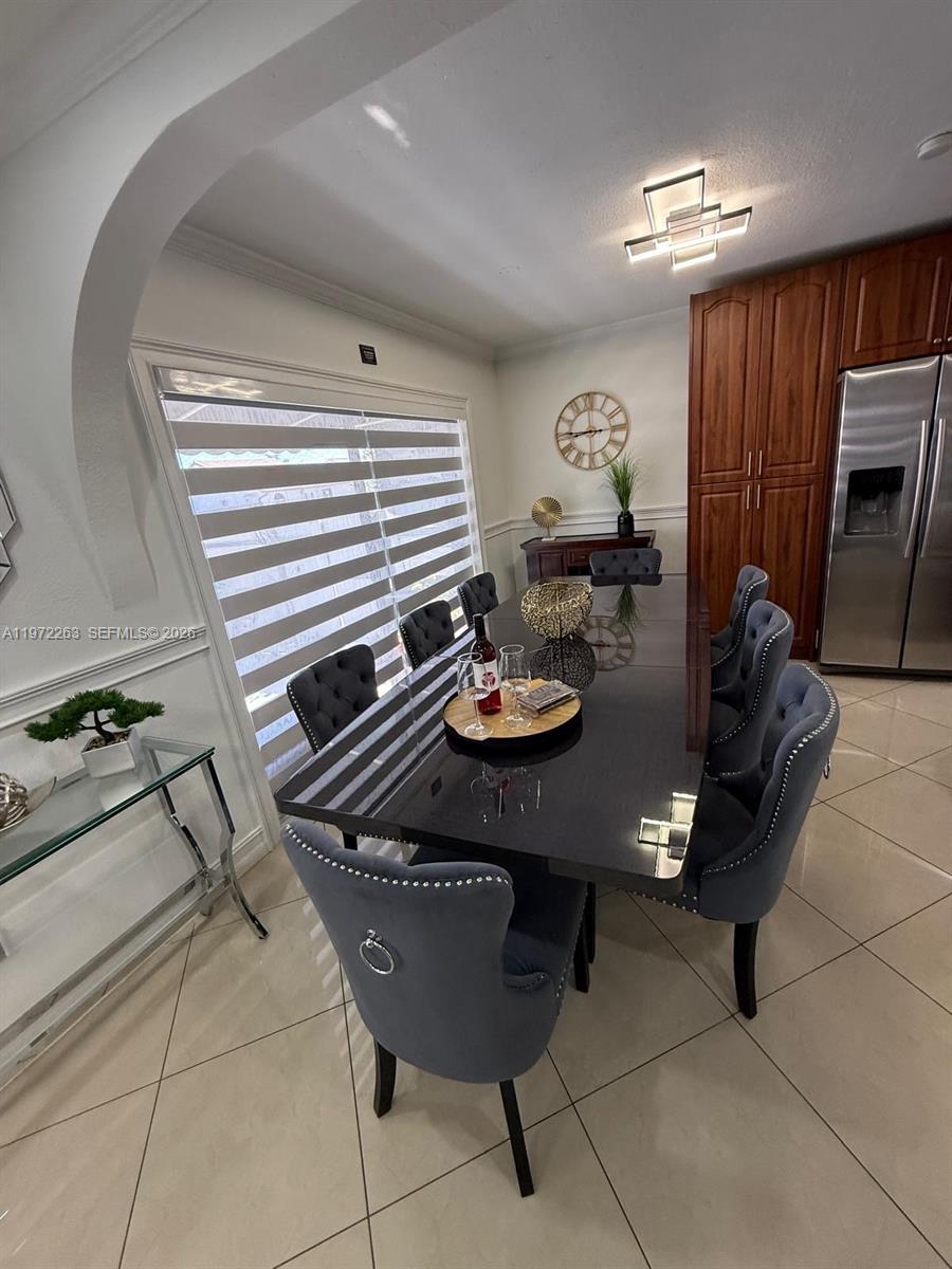 15445 Southwest 57th Street Miami, FL 33193 - Photo 12 of 78 a view of a dining room with furniture