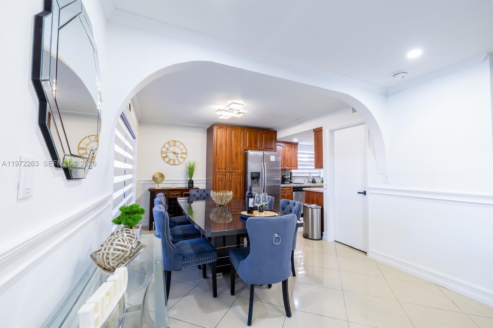15445 Southwest 57th Street Miami, FL 33193 - Photo 13 of 78 a view of a dining room with furniture window and wooden floor