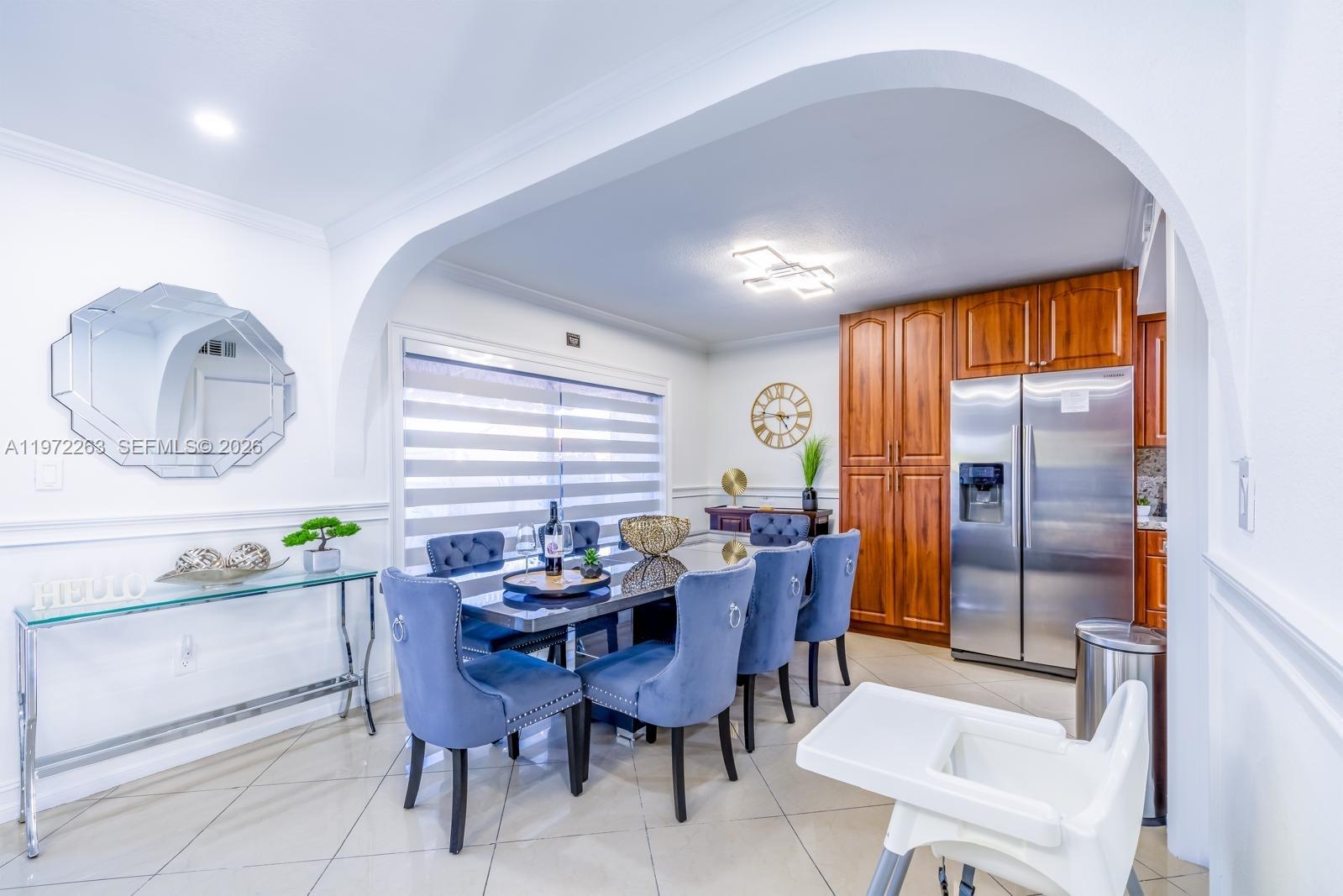 15445 Southwest 57th Street Miami, FL 33193 - Photo 14 of 78 a dining room with furniture and a window