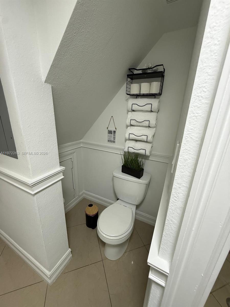 15445 Southwest 57th Street Miami, FL 33193 - Photo 26 of 78 a bathroom with a toilet and a shower