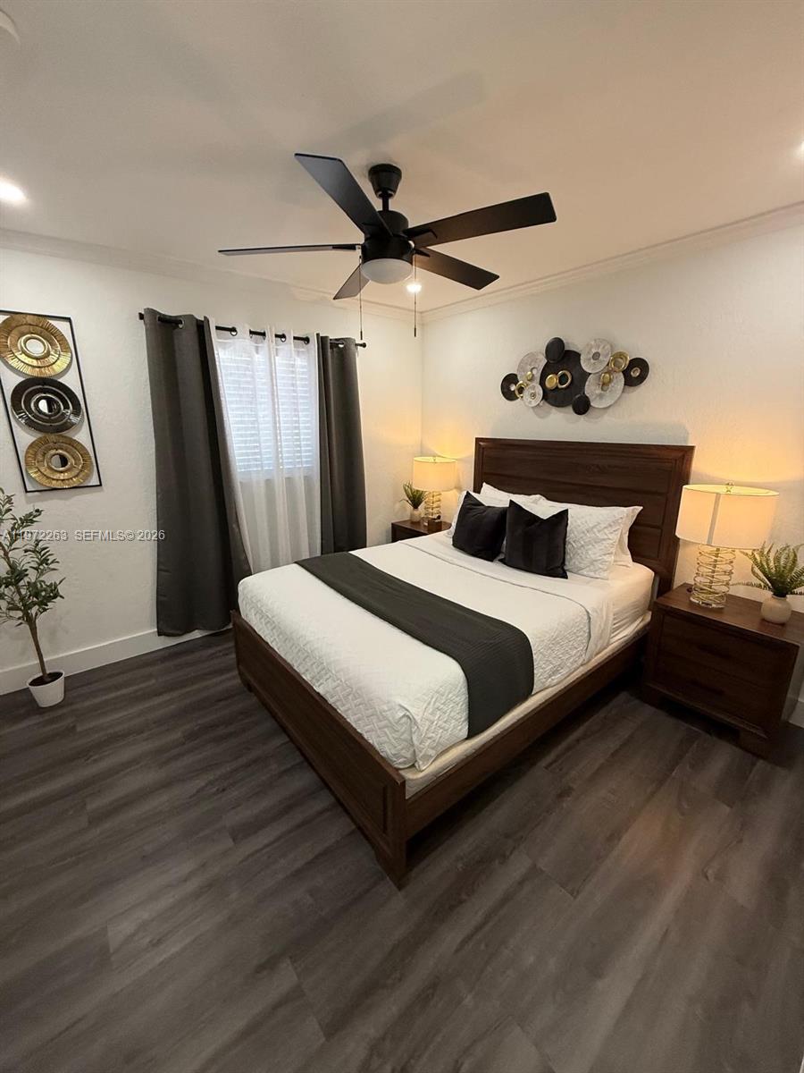 15445 Southwest 57th Street Miami, FL 33193 - Photo 27 of 78 a bedroom with bed and a window