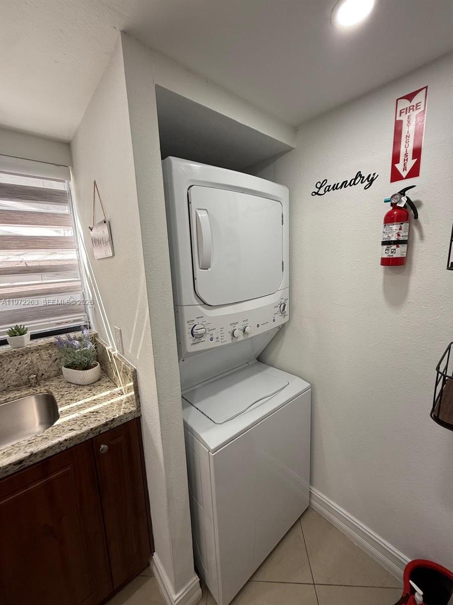 15445 Southwest 57th Street Miami, FL 33193 - Photo 49 of 78 a utility room with dryer and washer