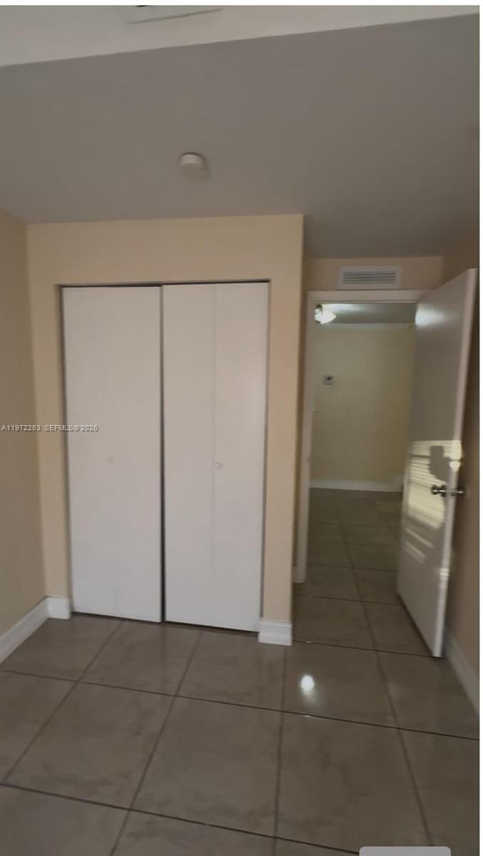 15445 Southwest 57th Street Miami, FL 33193 - Photo 58 of 78 a bathroom with a shower and toilet