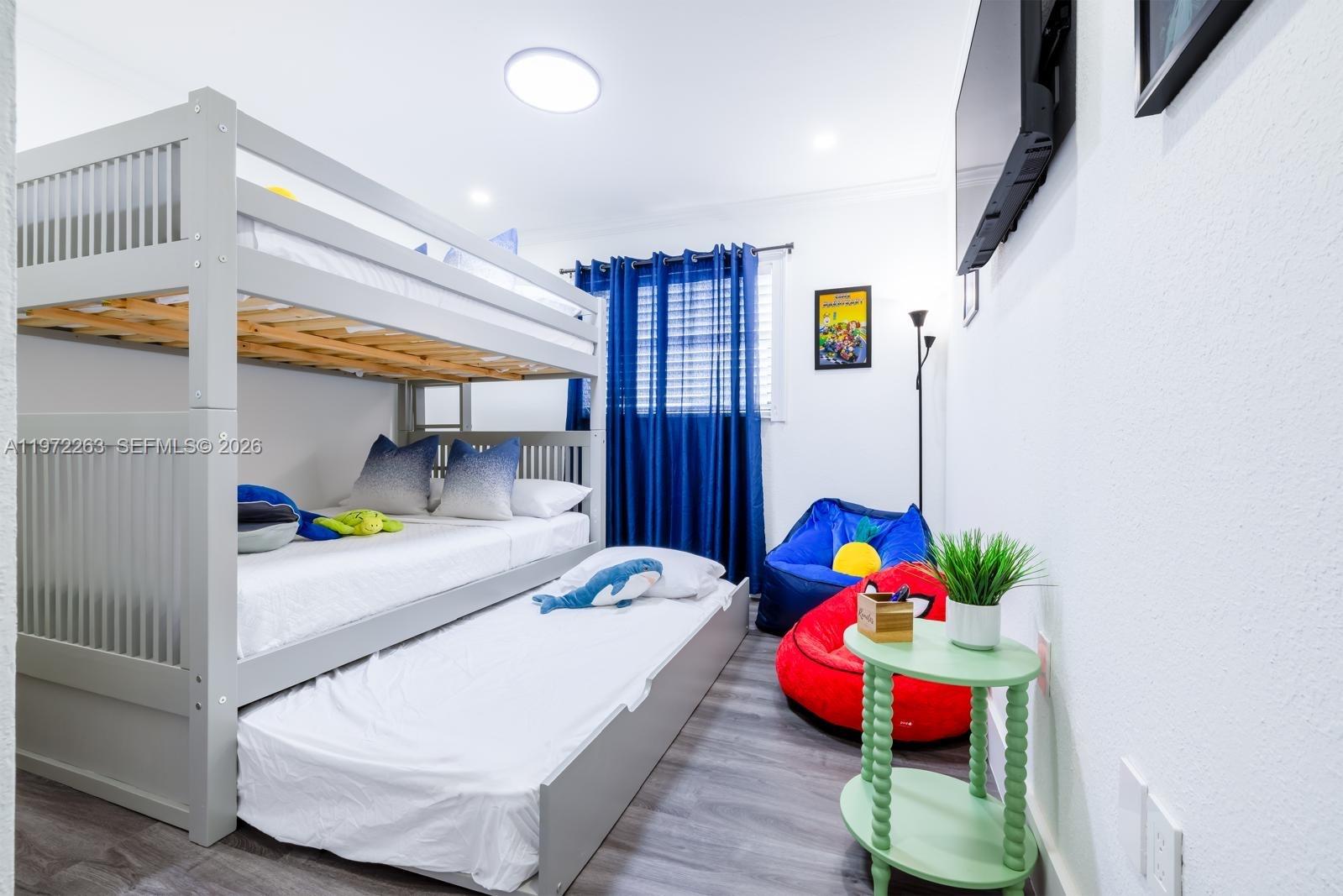 15445 Southwest 57th Street Miami, FL 33193 - Photo 71 of 78 a bedroom with bed and a window