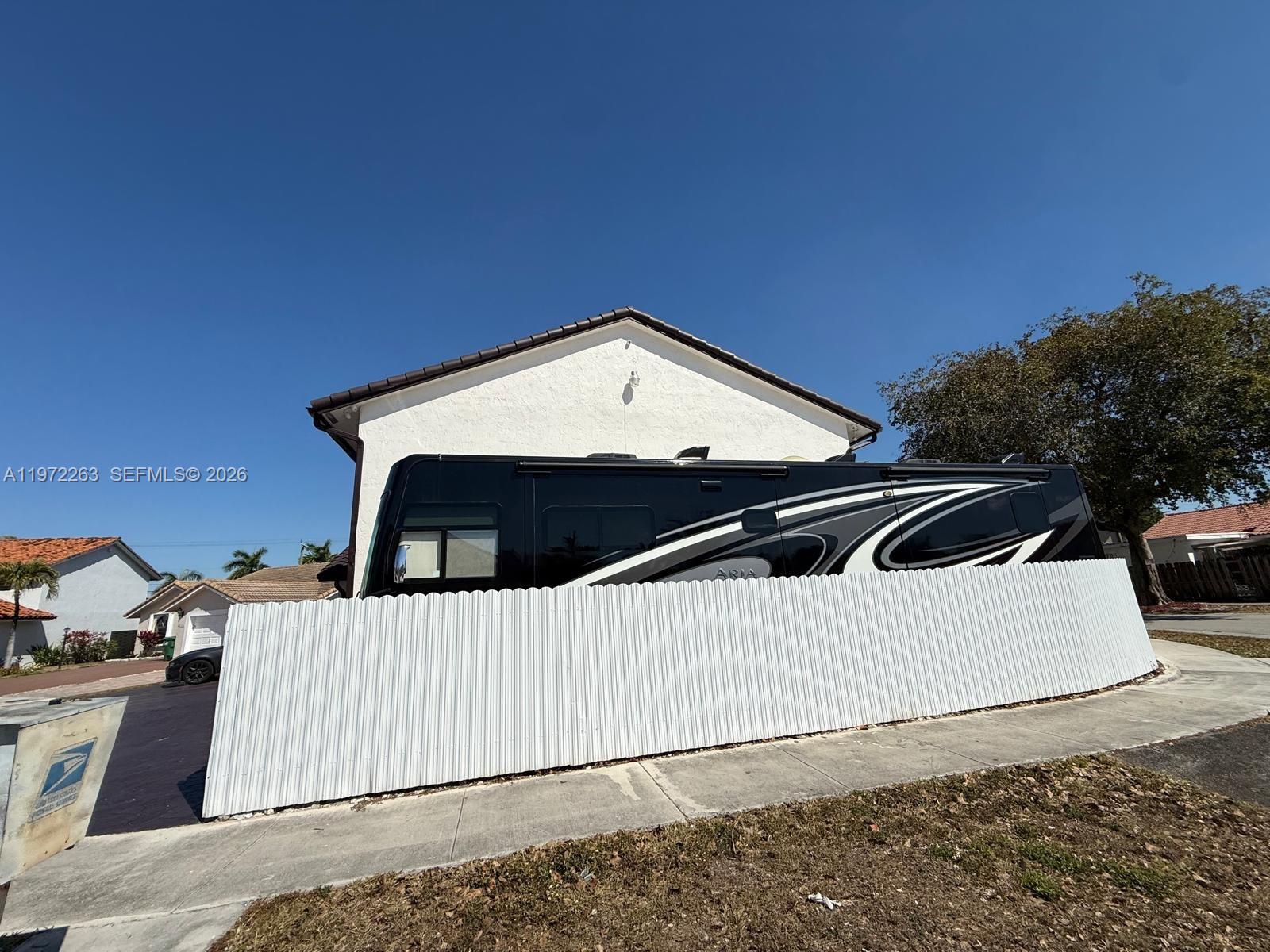 15445 Southwest 57th Street Miami, FL 33193 - Photo 8 of 78 a house with trees in the background