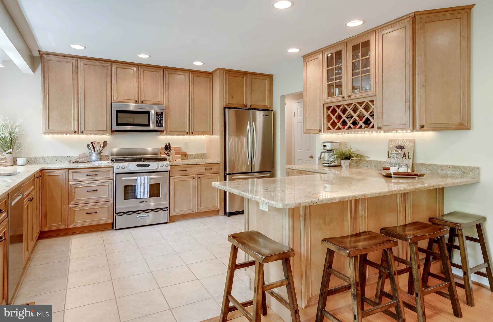 1602 Comanche Road Arnold, MD 21012 - Photo 9 of 40 Revamped Granite & Stainless Dining Bar Kitchen