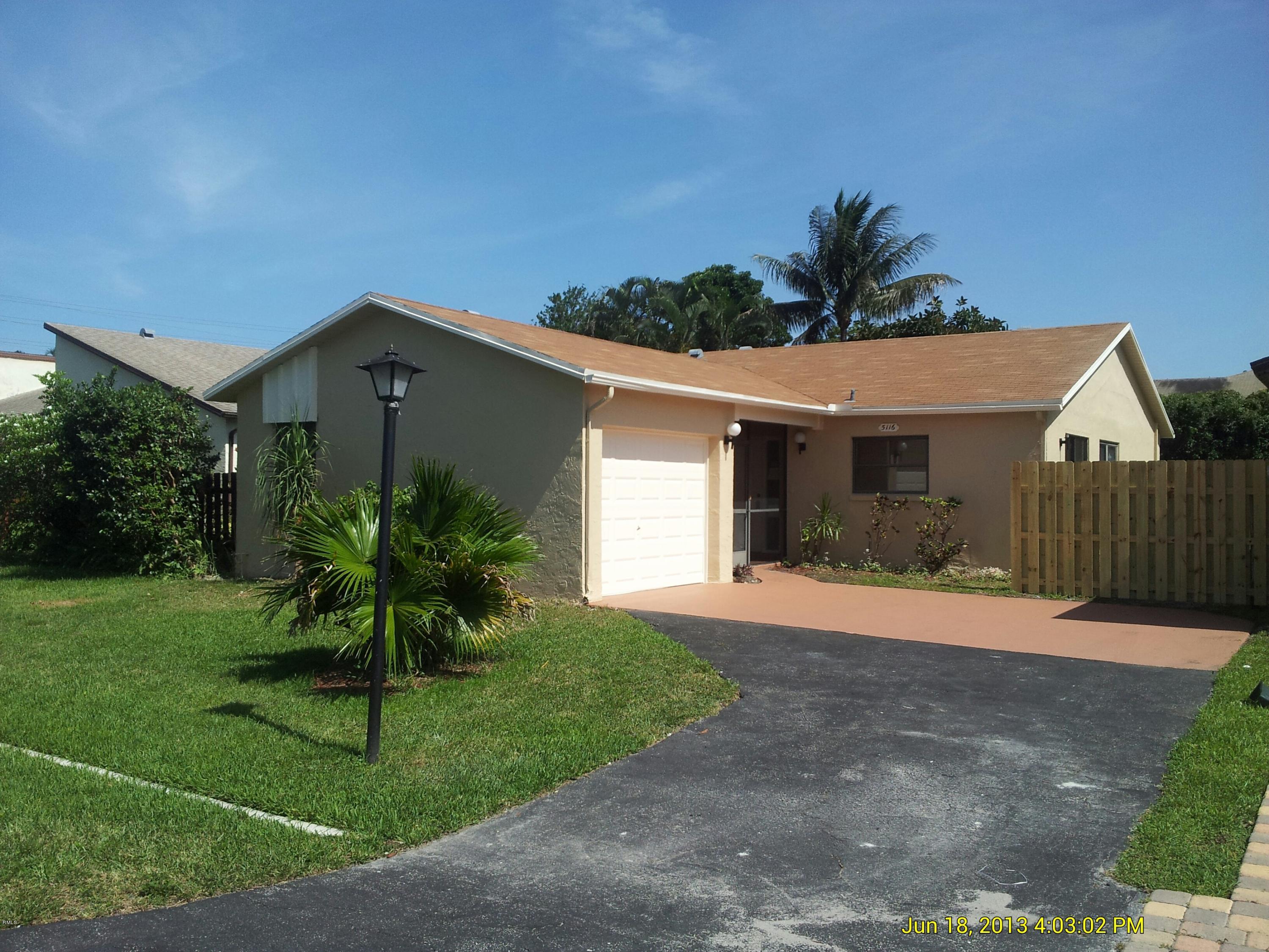 5116 Minto Road Boynton Beach, FL 33472 - Photo 1 of 10 Front