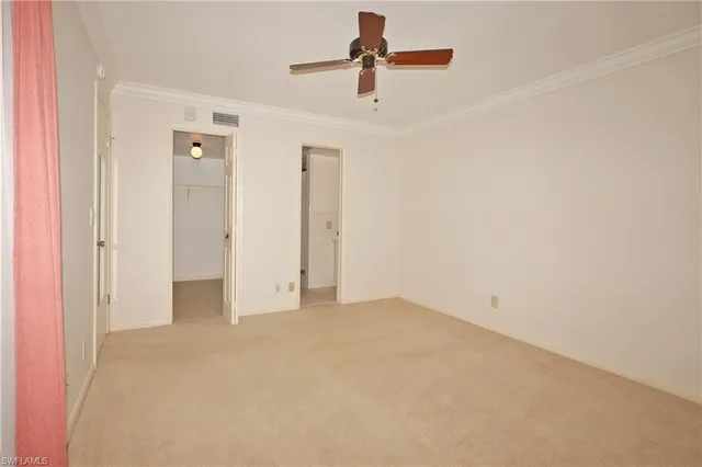 a bathroom with a sink toilet vanity and mirror