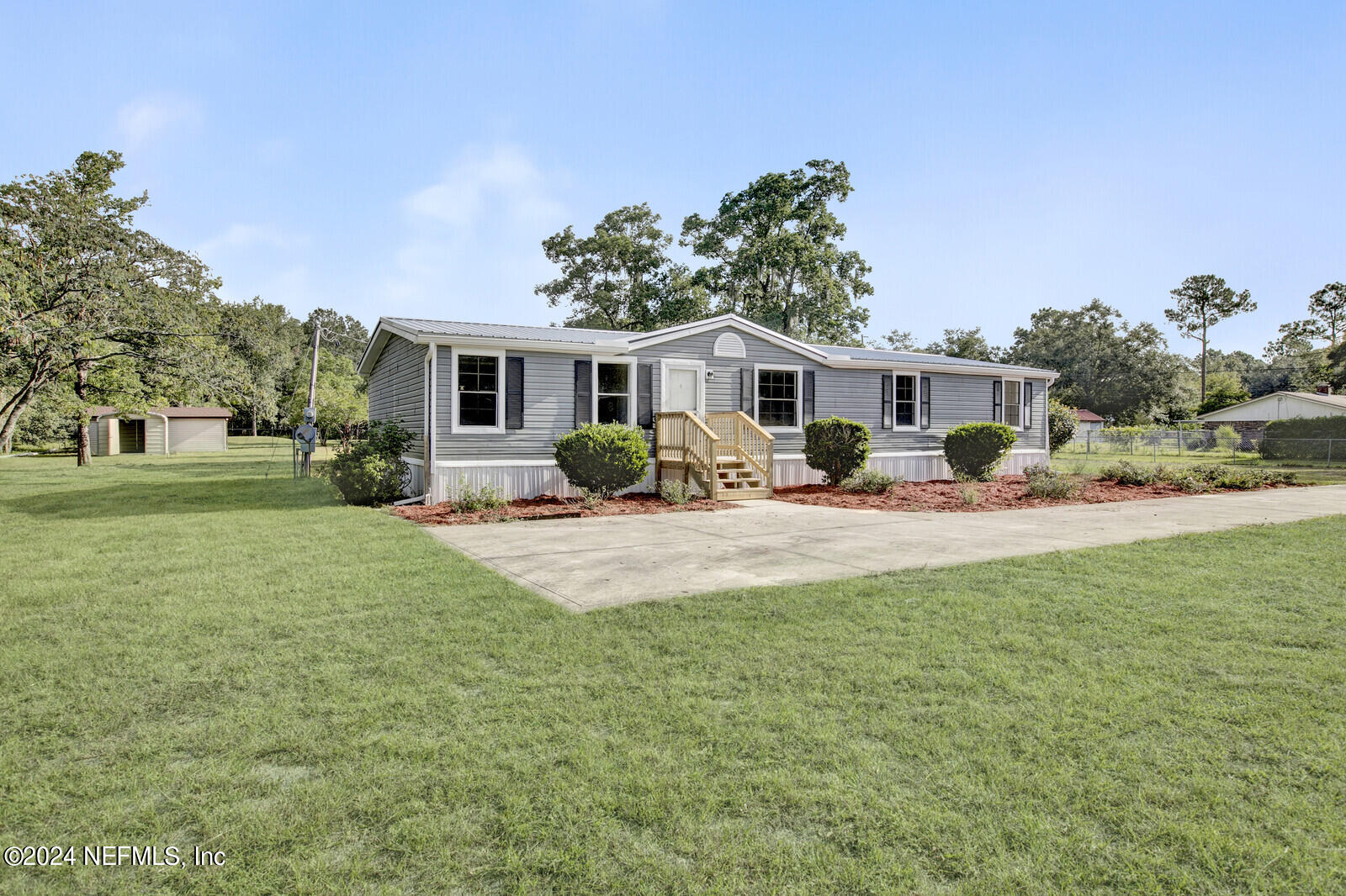 4016 Pinto Road Middleburg, FL 32068 - Photo 4 of 37 a view of a house with a backyard