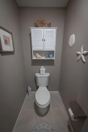 a kitchen with stainless steel appliances granite countertop a refrigerator and a stove