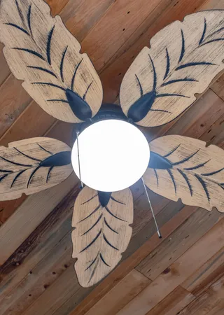 a view of a lake with beach and green space