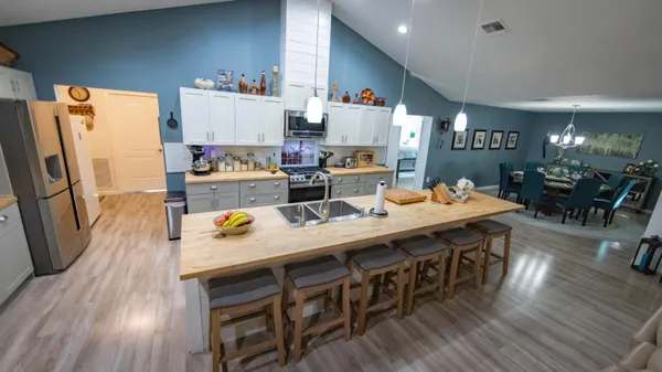 a dining room with furniture and window