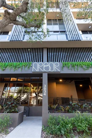 a view of a patio with table and chairs with wooden floor