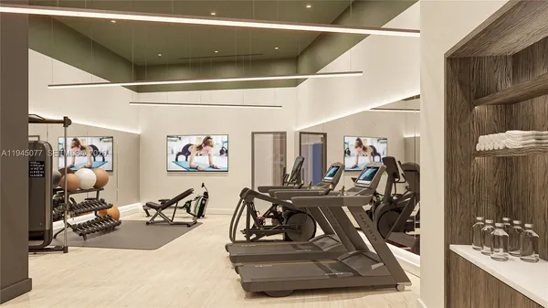 a view of a room with gym equipment