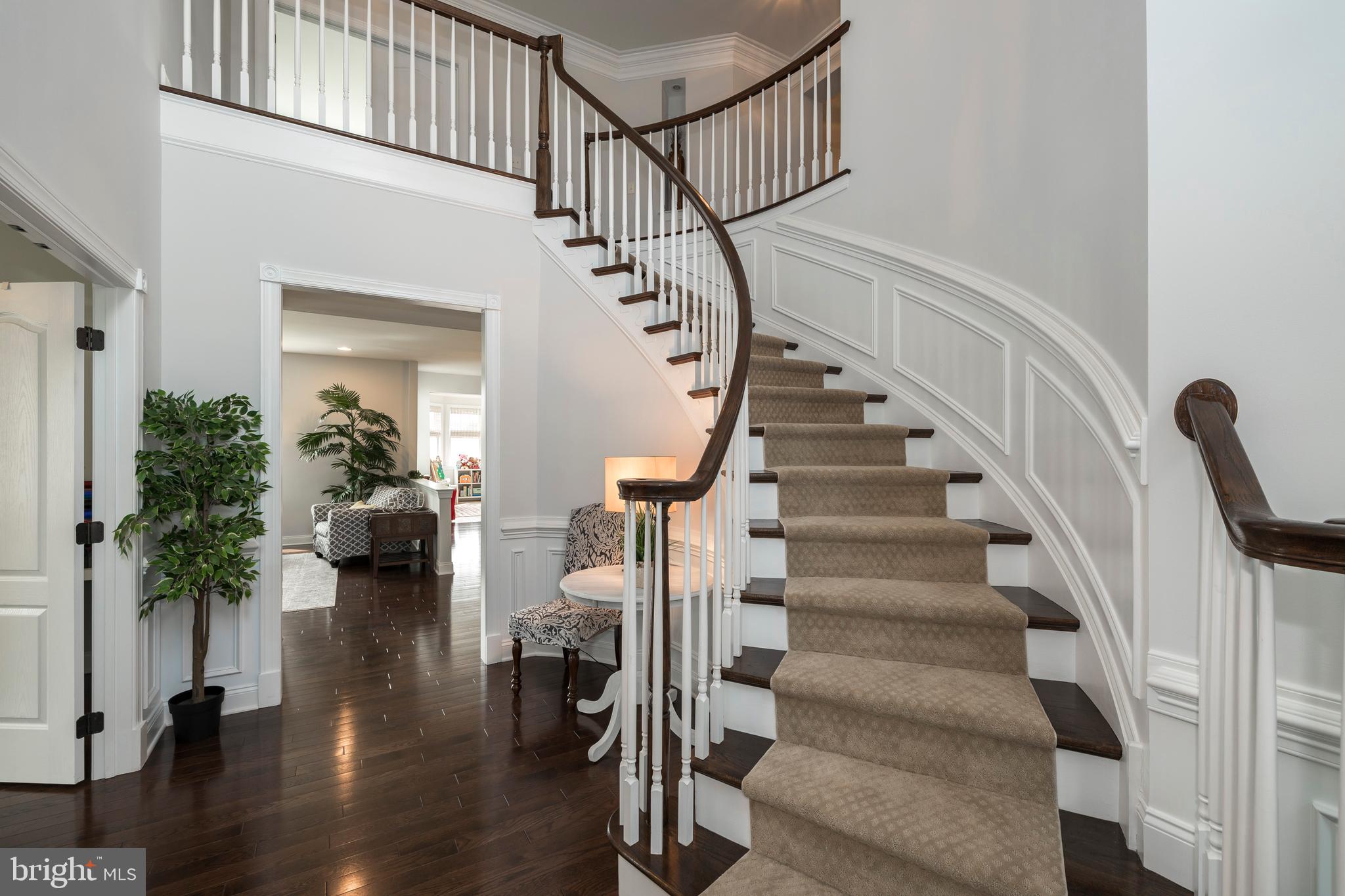 3995 Powell Road Chester Springs, PA 19425 - Photo 13 of 56 Elegant Curved Staircase and Stunning Hardwood