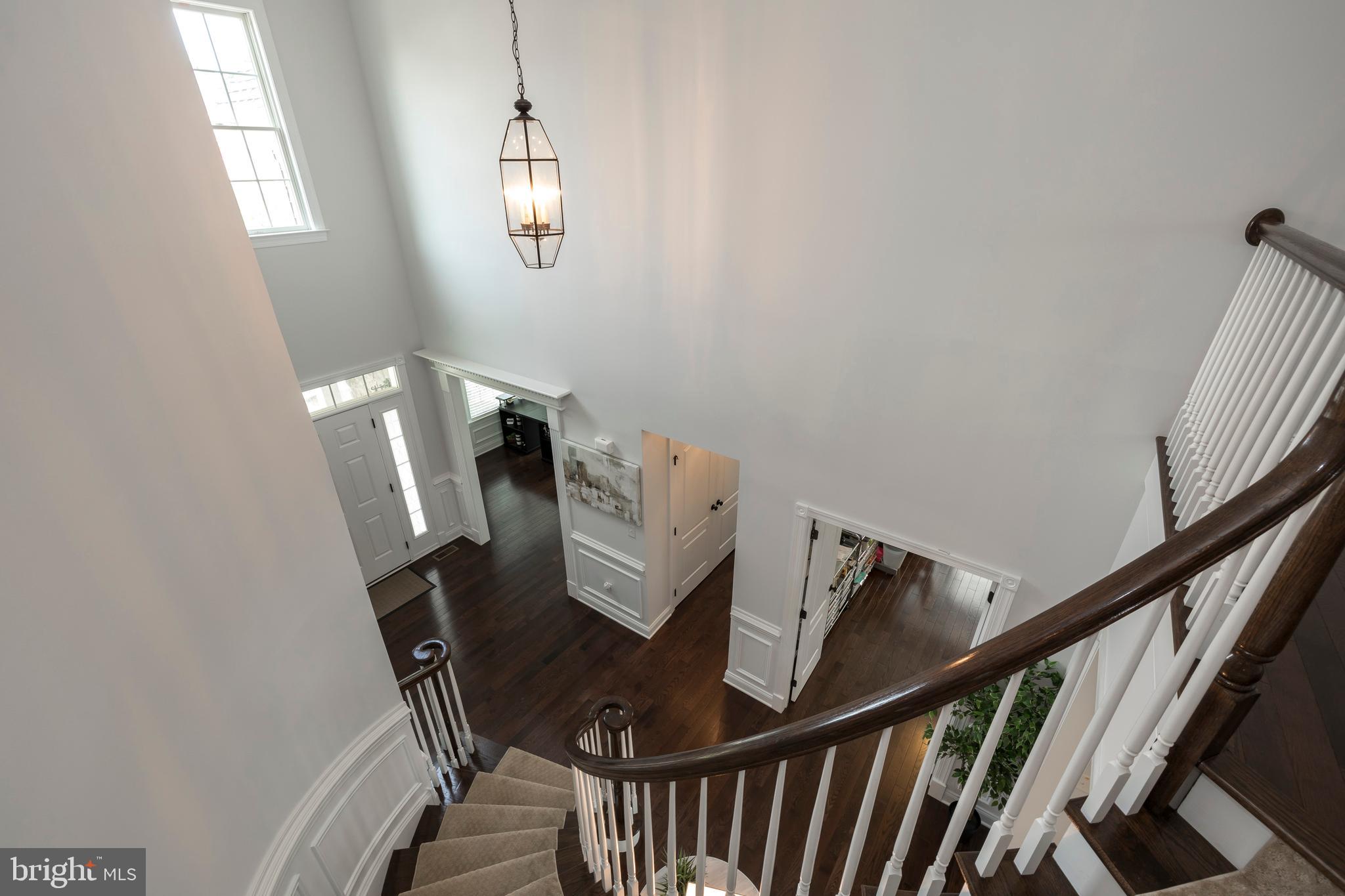 3995 Powell Road Chester Springs, PA 19425 - Photo 31 of 56 Elegant Curved Staircase and Two Story Foyer
