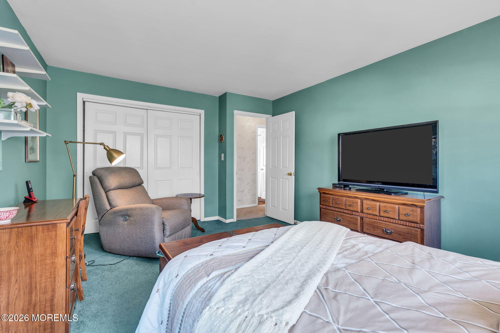 85 Radcliffe Drive Lincroft, NJ 07738 - Photo 49 of 49 a bedroom with two beds and a television