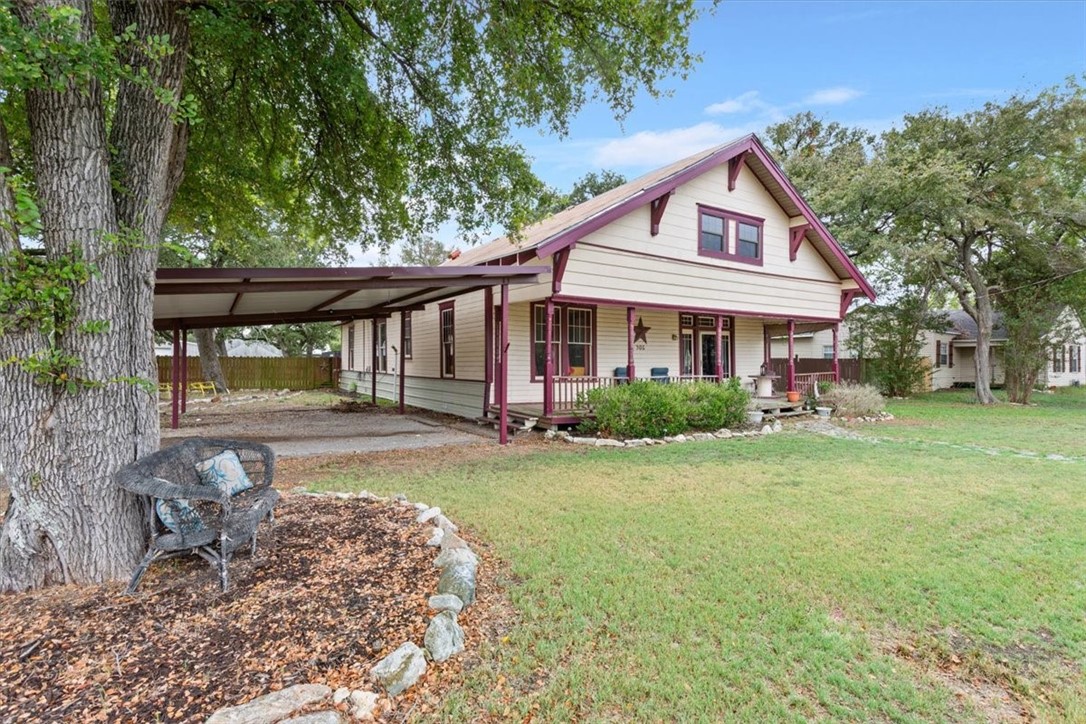 506 East Frederick Street Riesel, TX 76682 - Photo 2 of 30 a view of a yard in front of house