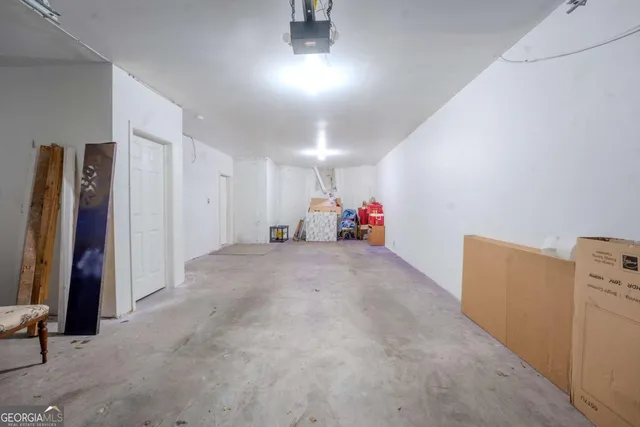 a view of a room with clothes and shoes