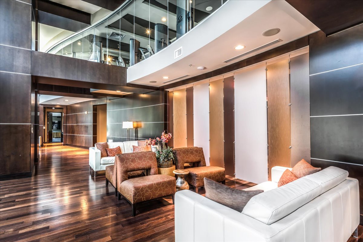 360 Nueces Street, Unit 4203 Austin, TX 78701 - Photo 30 of 40 Common area featuring a towering ceiling and recessed lighting