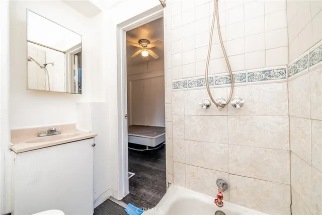 a bathroom with a sink and a shower