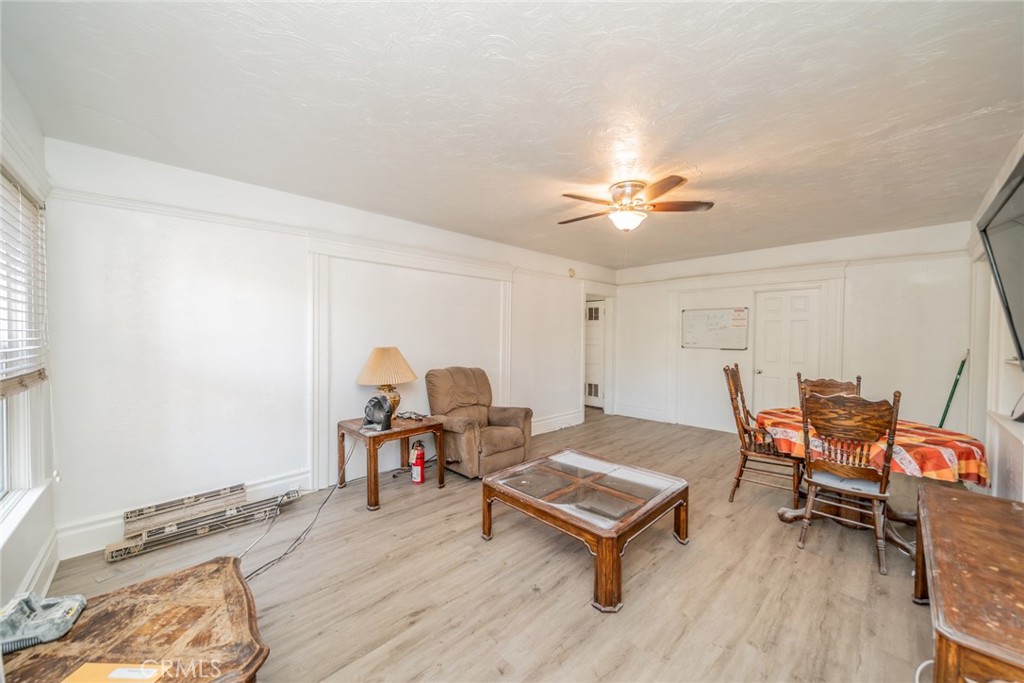 3987 4th Street Riverside, CA 92501 - Photo 19 of 33 a living room with furniture and a table