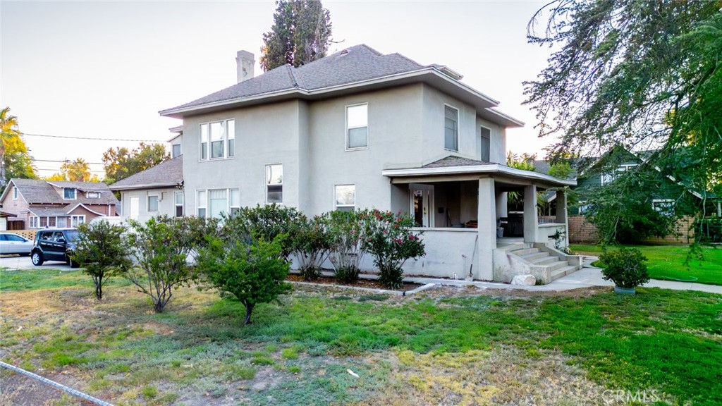 3987 4th Street Riverside, CA 92501 - Photo 29 of 33 a front view of a house with a yard