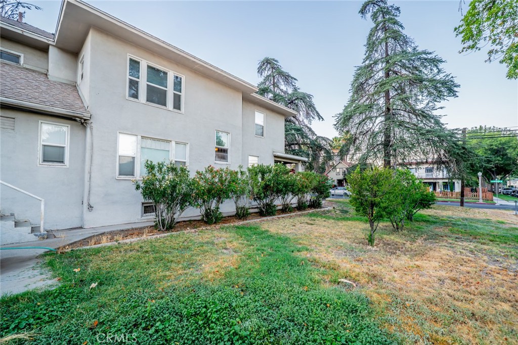 3987 4th Street Riverside, CA 92501 - Photo 6 of 33 a view of a house with a yard and plants