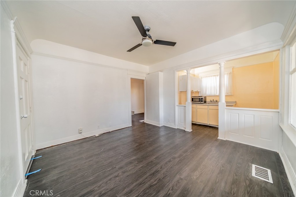 3987 4th Street Riverside, CA 92501 - Photo 8 of 33 a view of a kitchen with a sink refrigerator and window