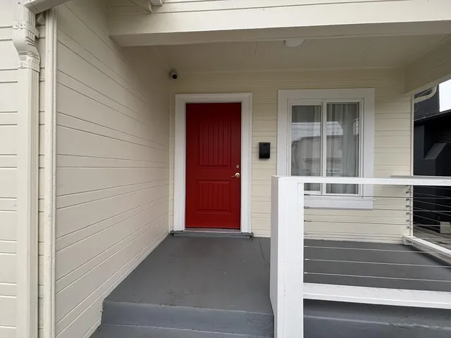 a kitchen with a refrigerator and countertop