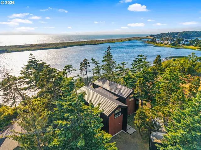 view of a lake with a yard