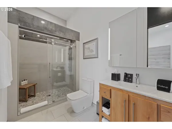 a view of a hallway with washer and dryer
