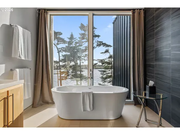 a open kitchen with a sink and a stove top oven