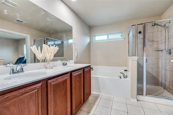 a view of a livingroom with furniture and a flat screen tv